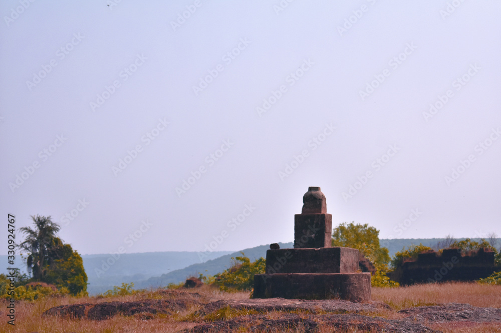 a stone structure for worship on top of a hill a stone structure for worship on top of a hill