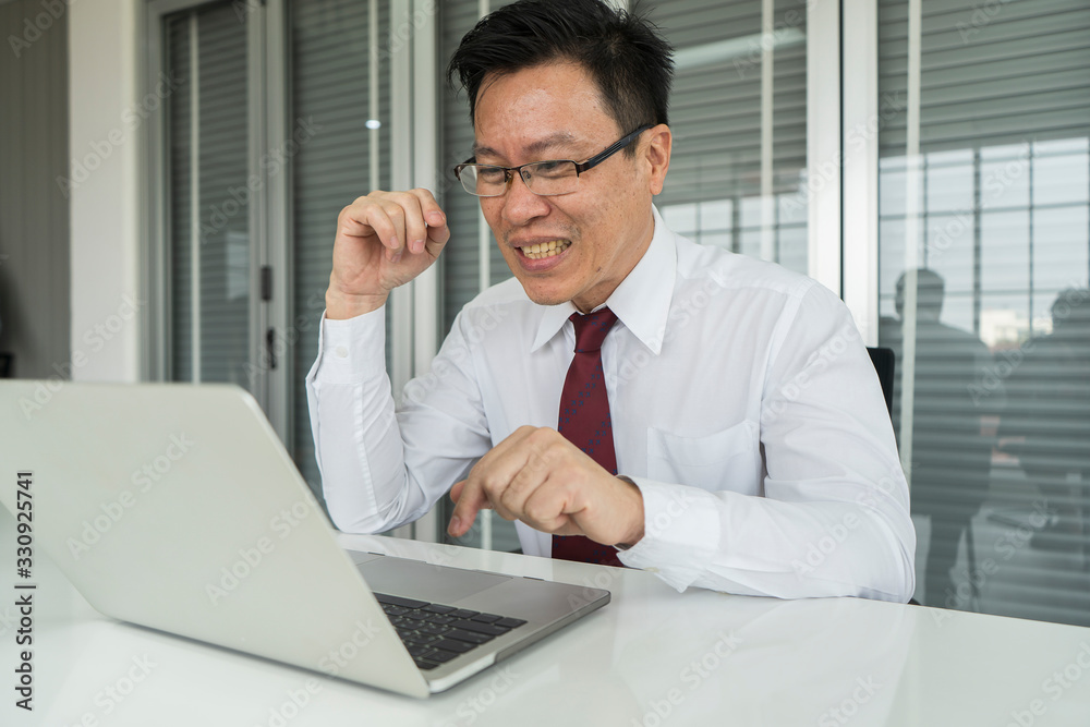 Asian Business people laptop using ,Social, media, Marketing Business negotiation with partner or working, keeping distance for infection risk and disease prevention measures, Technology Innovation Asian Business people laptop using ,Social, media, Marketing Business negotiation with partner or working, keeping distance for infection risk and disease prevention measures, Technology Innovation