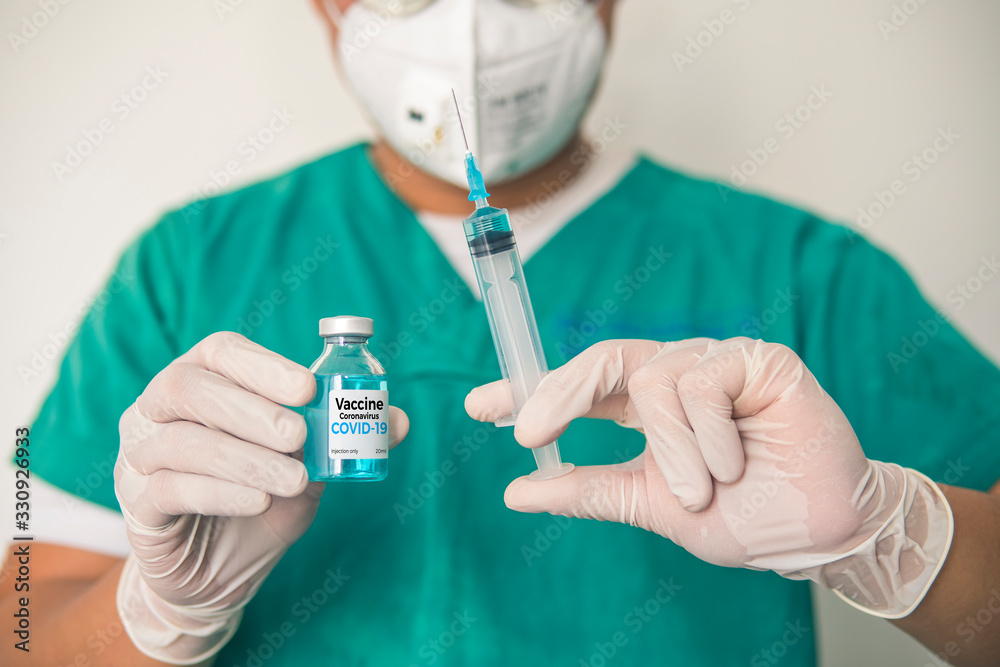 Vaccine and syringe injection. It use for prevention,immunization and treatment from corona virus infection(novel coronavirus disease 2019,COVID-19,nCoV 2019 from Wuhan). Medicine infectious concept. Vaccine and syringe injection. It use for prevention,immunization and treatment from corona virus infection(novel coronavirus disease 2019,COVID-19,nCoV 2019 from Wuhan). Medicine infectious concept.