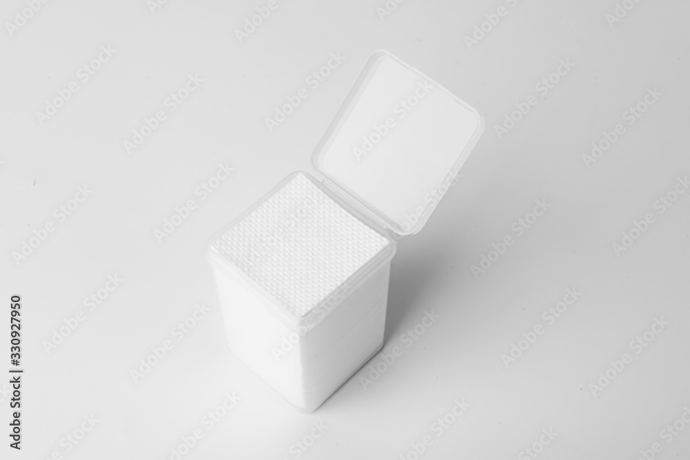 The cotton pad is on a white background