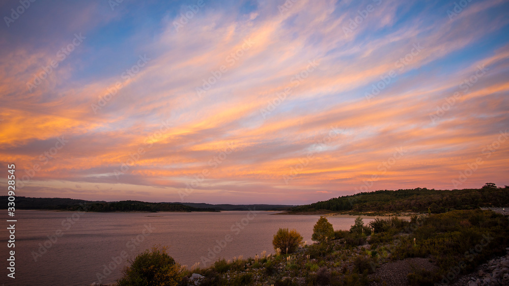 Colorful sunset with glowing clouds in the sky Colorful sunset with glowing clouds in the sky