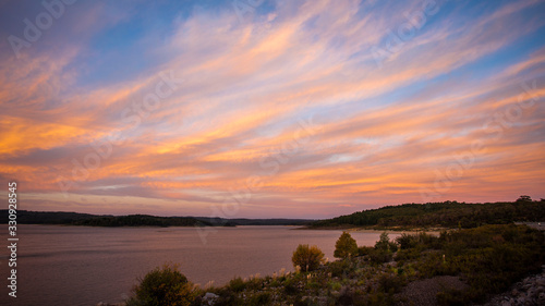 Colorful sunset with glowing clouds in the sky