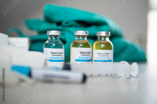 Vaccine and syringe injection. It use for prevention,immunization and treatment from corona virus infection(novel coronavirus disease 2019,COVID-19,nCoV 2019 from Wuhan). Medicine infectious concept.