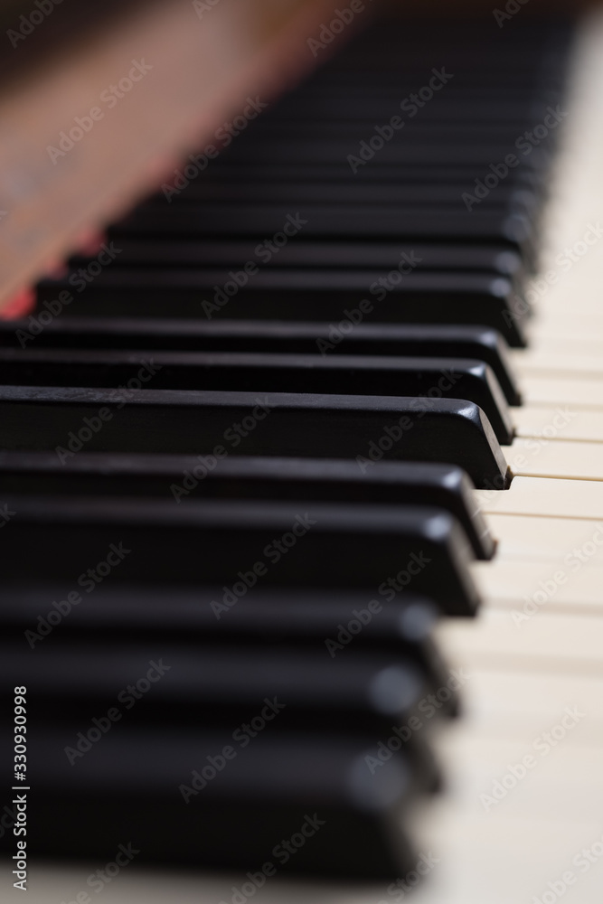 Piano keys. Old piano German construction. Selective focus