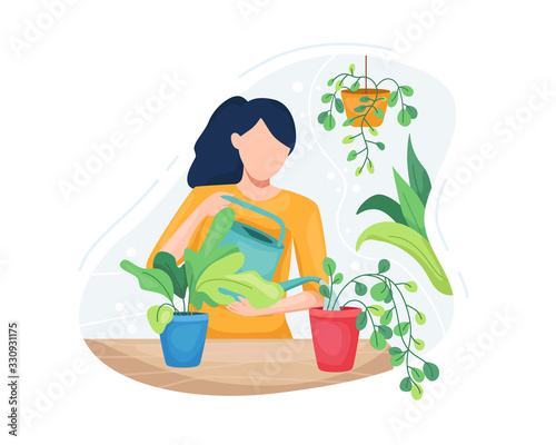 Young woman taking care plants