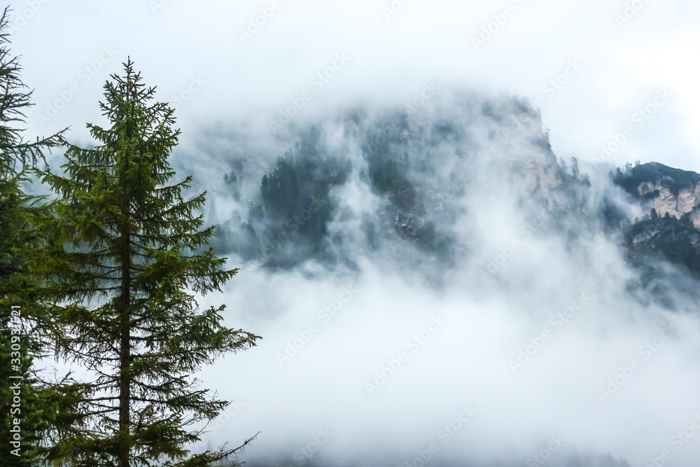 Cloudy day in italian mountains. Mountain landscape in South Tyrol province.