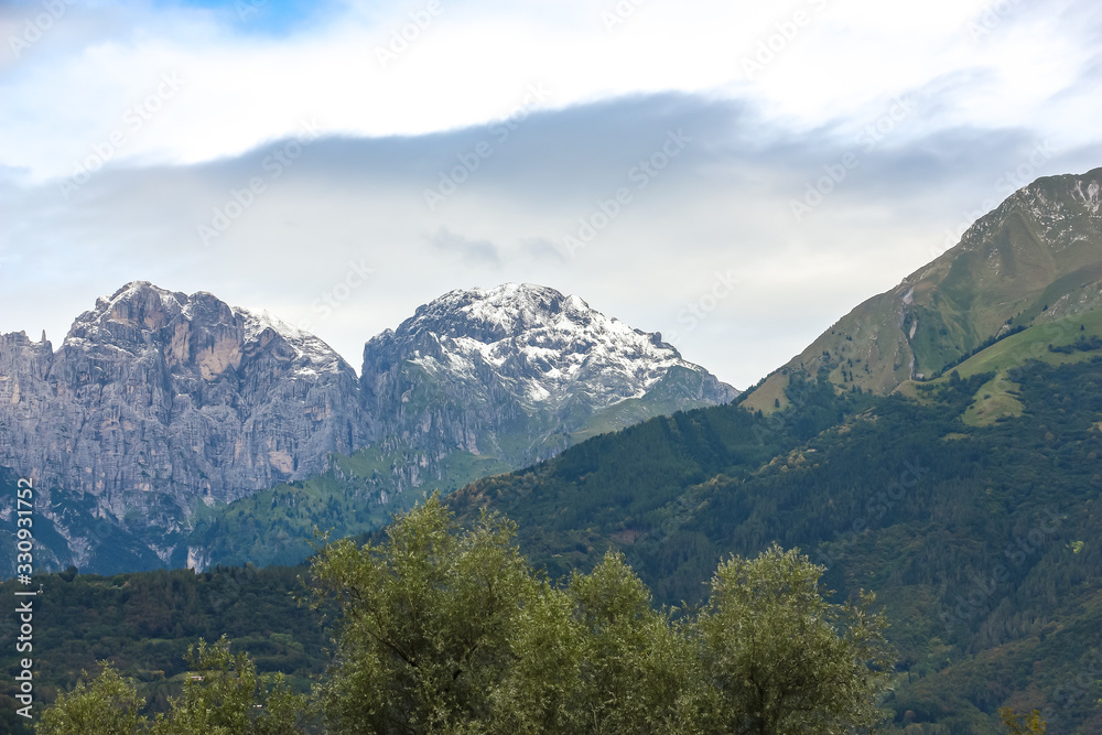 Cloudy day in italian mountains. Mountain landscape in Belluno province.