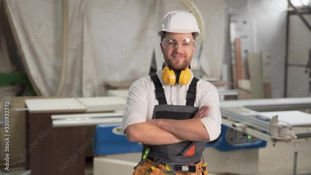 the joiner looks into the camera and smiles the joiner looks into the camera and smiles