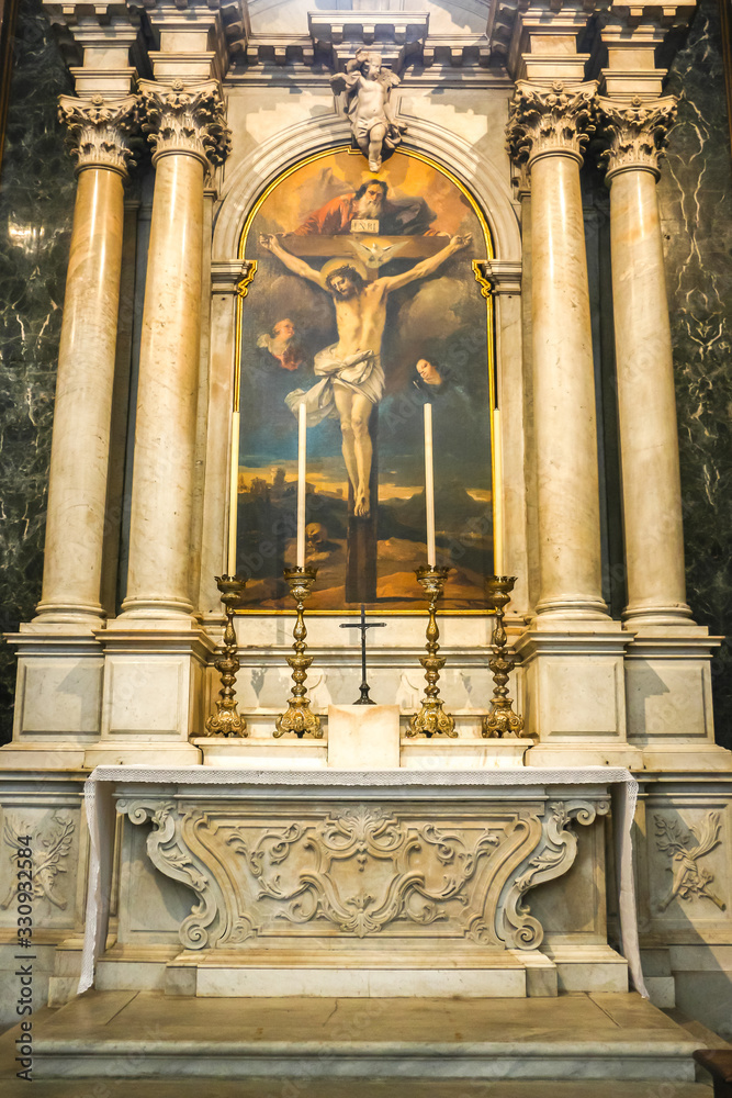Fototapeta premium Udine, Italy. Interiors of catholic church (Cathedral of Santa Maria Annunziata) in Udine.