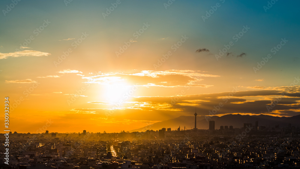 Tehran skyline at the sunset with Milad tower in the frame, colorful photo of Tehran-Iran cityscape