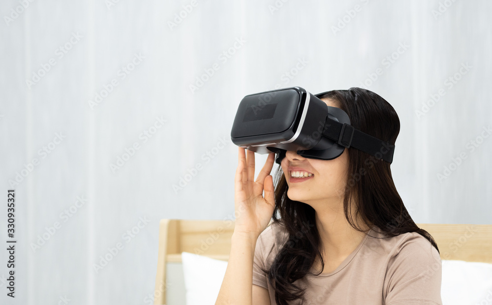 Woman plays virtual reality Woman plays virtual reality