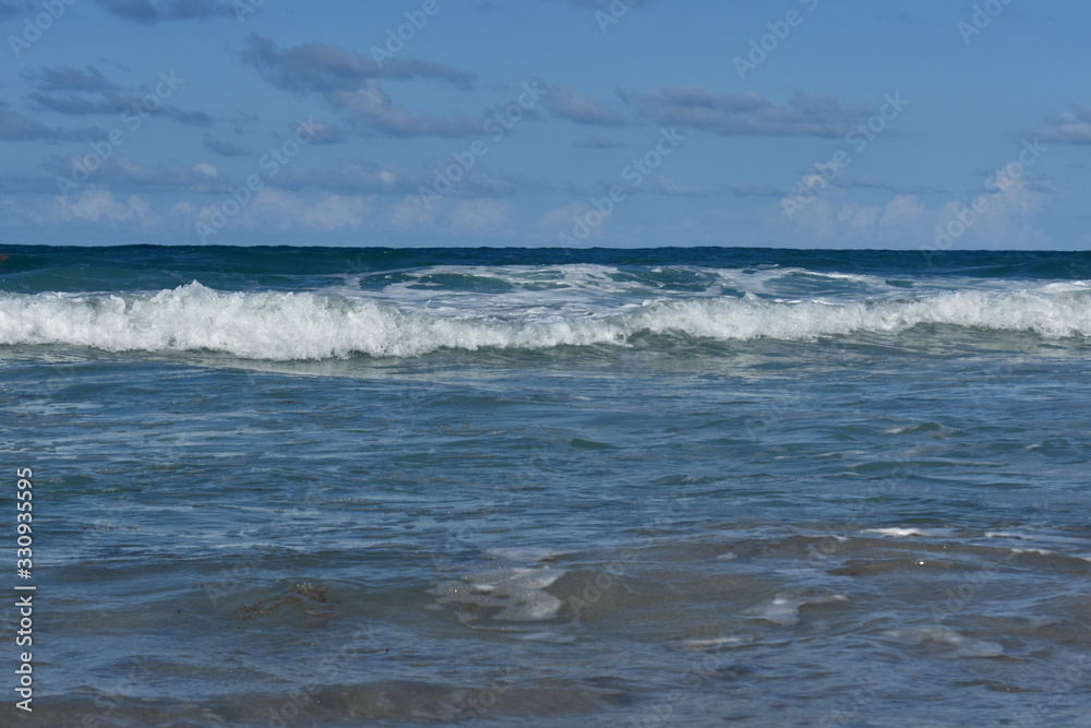 waves break on the shore. Atlantic ocean. Dominican Republic