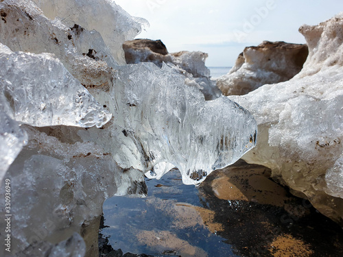 Spring ice on The white sea coast. The Island Of Yagry. Severodvinsk. The Arkhangelsk region. photo