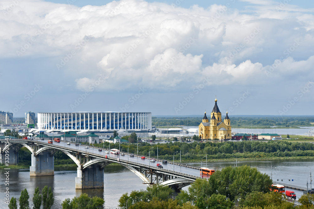 panorama of the city of Nizhny Novgorod in the summer. confluence of the Oka and Volga rivers . football stadium. temple