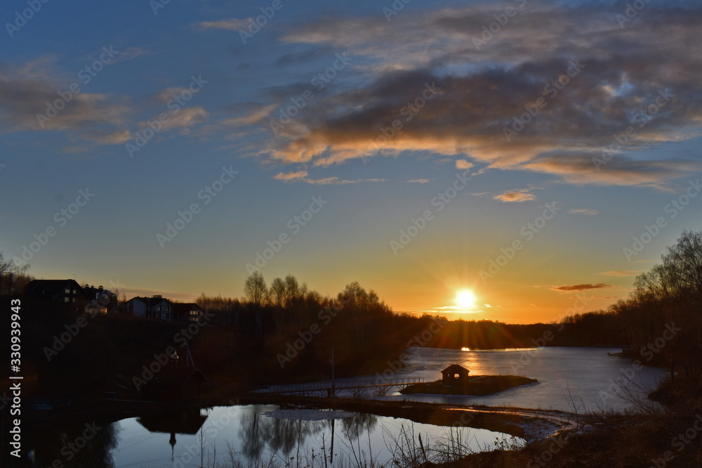 Obraz premium colorful sunrise over the lake. Spring. Russia