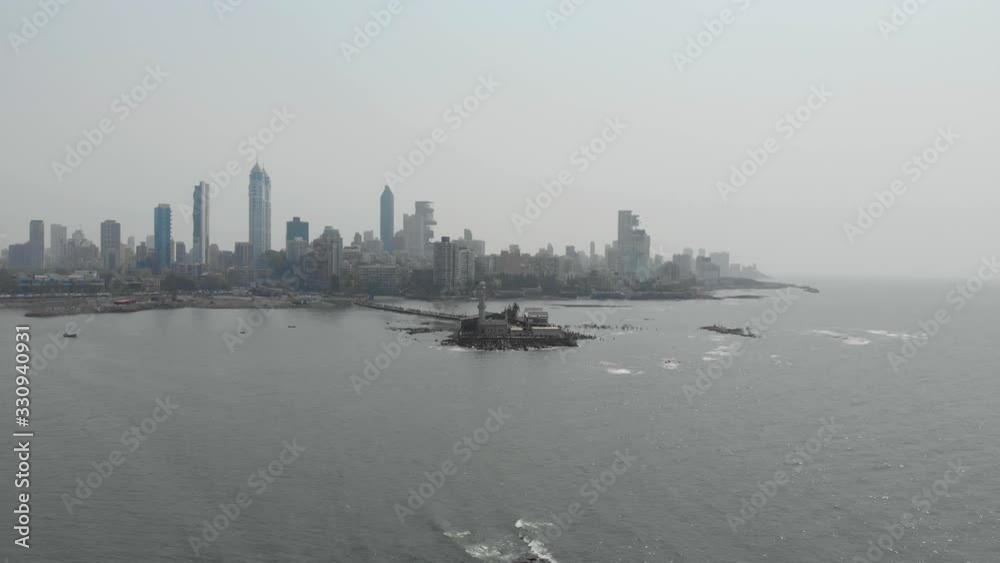 Haji Ali dargah sea mosque with Mumbai city in the background Haji Ali dargah sea mosque with Mumbai city in the background