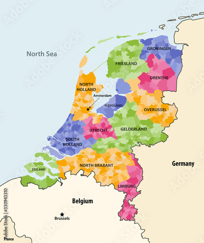 Netherlands local municipalities colored by provinces map with neighbouring countries and terrotories. Vector