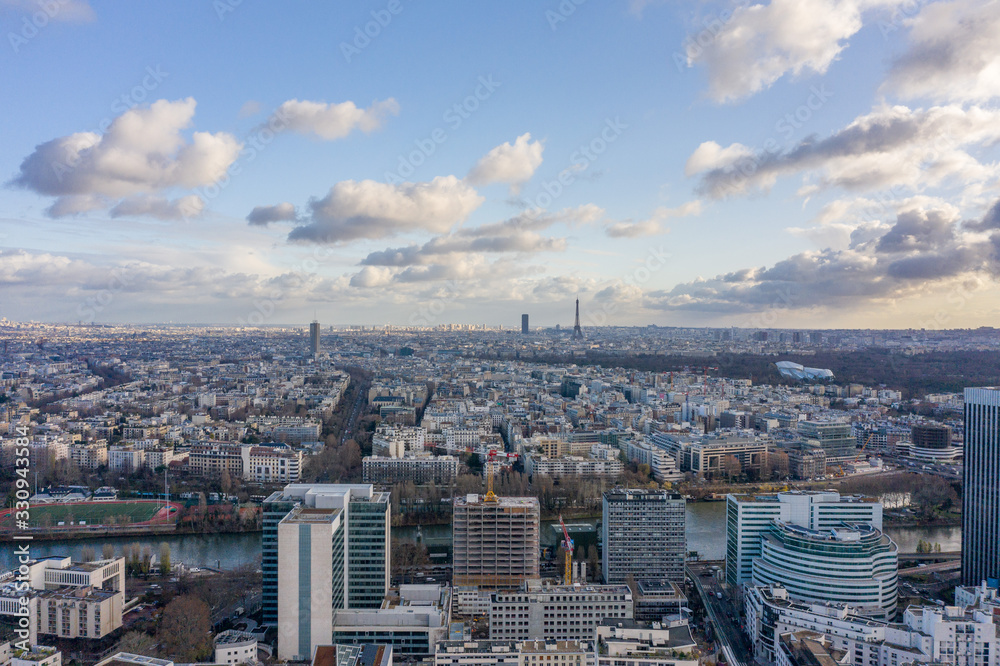 Aerial drone shot of Levallois Paris with Eiffel Tower  jardin d'acclimation