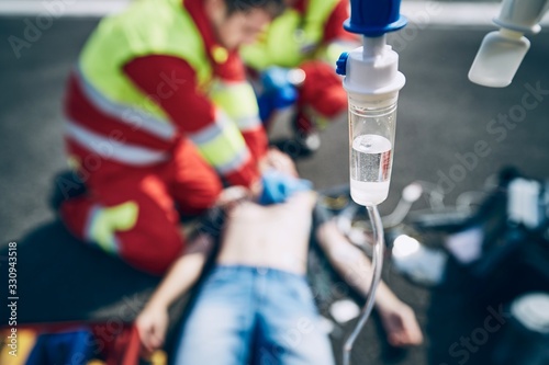 Cardiopulmonary resuscitation on the road photo