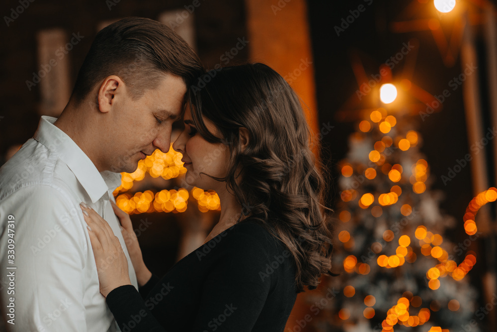 tender and sensual hugs of husband and his pregnant wife