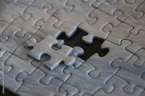 Completing missing piece of the puzzle - Concept of teamwork, resourcing, hiring, solutions and strategy