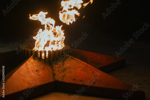 eternal flame at the monument to the heroes of the second world war photo