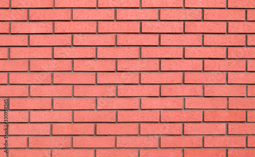 Reliable, Strong Brick Wall. Protective Structure. Coral Brick Wall Texture.