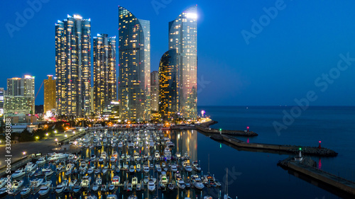 Photography Busan City building skyline and skyscraper business and financial office beautiful construction architecture park marina, Gwangalli beach with yacht pier, Haeundae, Busan, South Korea