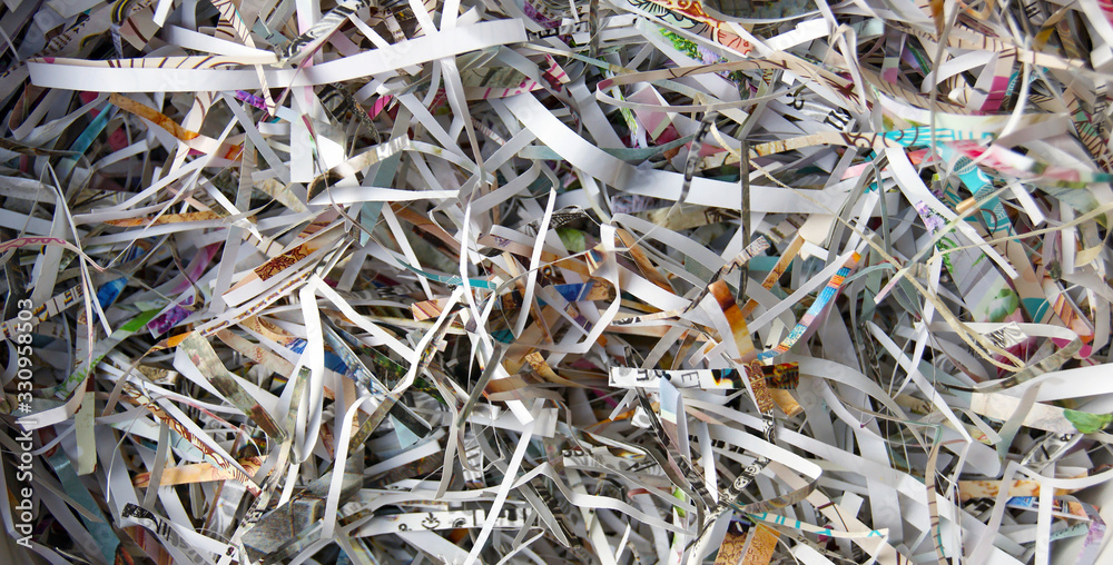 CloseUp shredded paper texture and reuse paper scrap background.