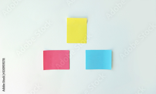 Empty space on multi-colored office stickers.