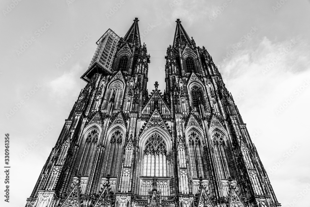 Black and white facade of the gothic cathedral a UNESCO world heritage site in Cologne, Germany