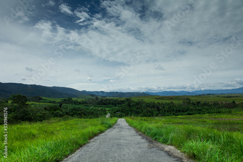 Road getting to mountains, Napu Village, Indonesia