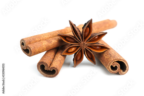 Fototapeta Naklejka Na Ścianę i Meble -  Cinnamon and anise star isolated on white background.