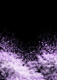 紫色の粒子が飛び散る