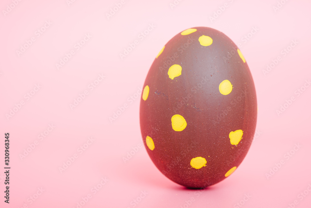 Beautiful Easter Brown egg color on pink Beautiful Easter Brown egg color on pink