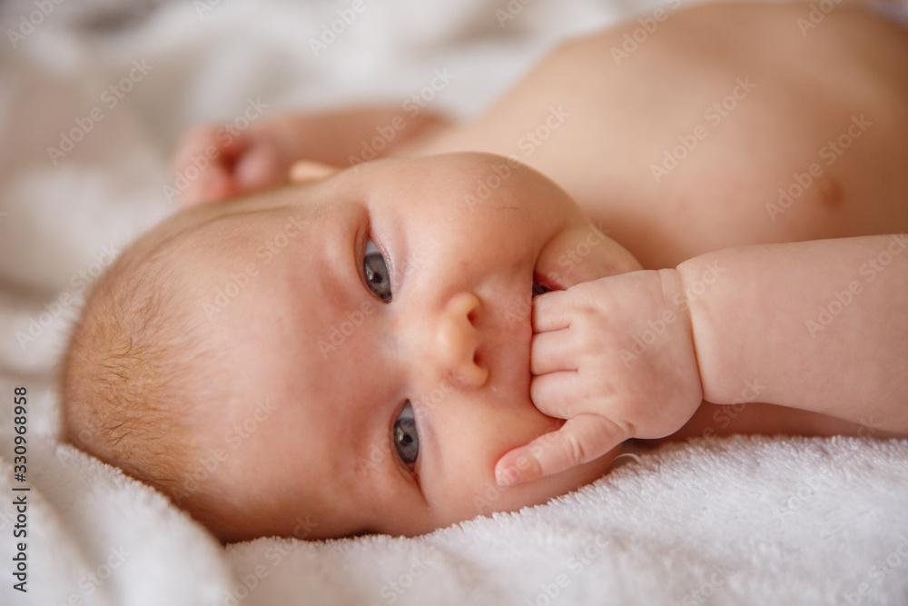 newborn baby licks the hand of the house newborn baby licks the hand of the house
