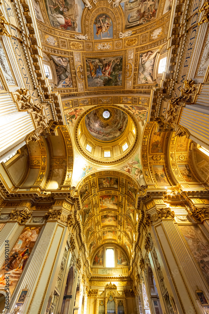 Obraz premium ROME, ITALY - May 2, 2015: The nave of baroque church Basilica di Sant Andrea della Valle. Famous basilica, Piazza Vidoni, built in Baroque style, 1608 AD. Church interior with reflection.