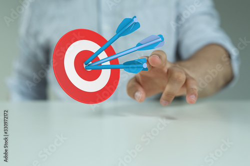 Dart arrow on target dartboard  Business success concept..