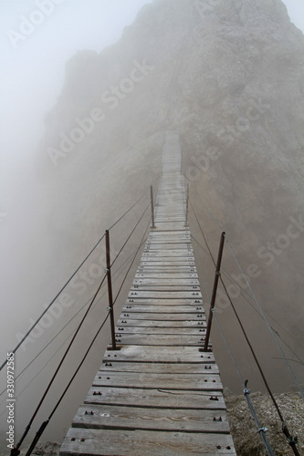 Fototapeta Naklejka Na Ścianę i Meble -  Ponte Cristallo, famous wooden suspension bridge on Monte Cristallo, Dolomites, Italy
