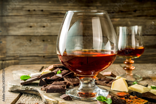 Glass of brandy, whiskey or cognac photo