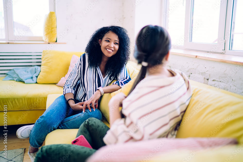 Female friends having pleasant conversation Female friends having pleasant conversation