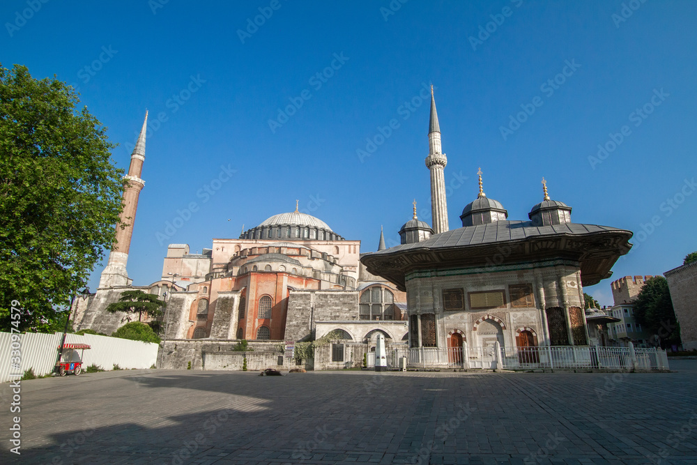 Istanbul, Turkey. Hagia Sophia Museum and Fountain of Sultan Ahmed III near Topkapi Palace entrance