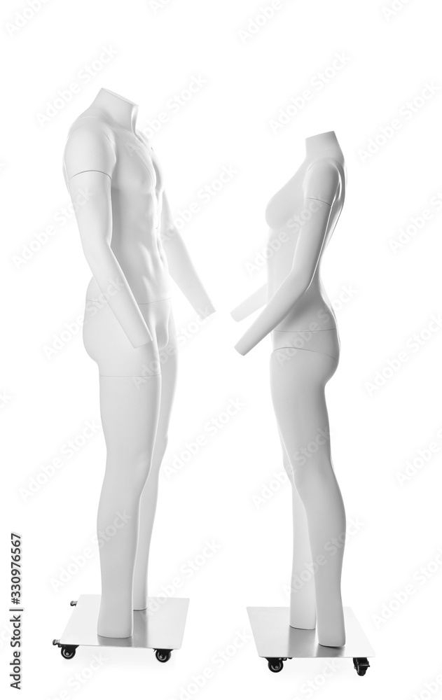 Male and female ghost headless mannequins with removable pieces isolated on white Male and female ghost headless mannequins with removable pieces isolated on white