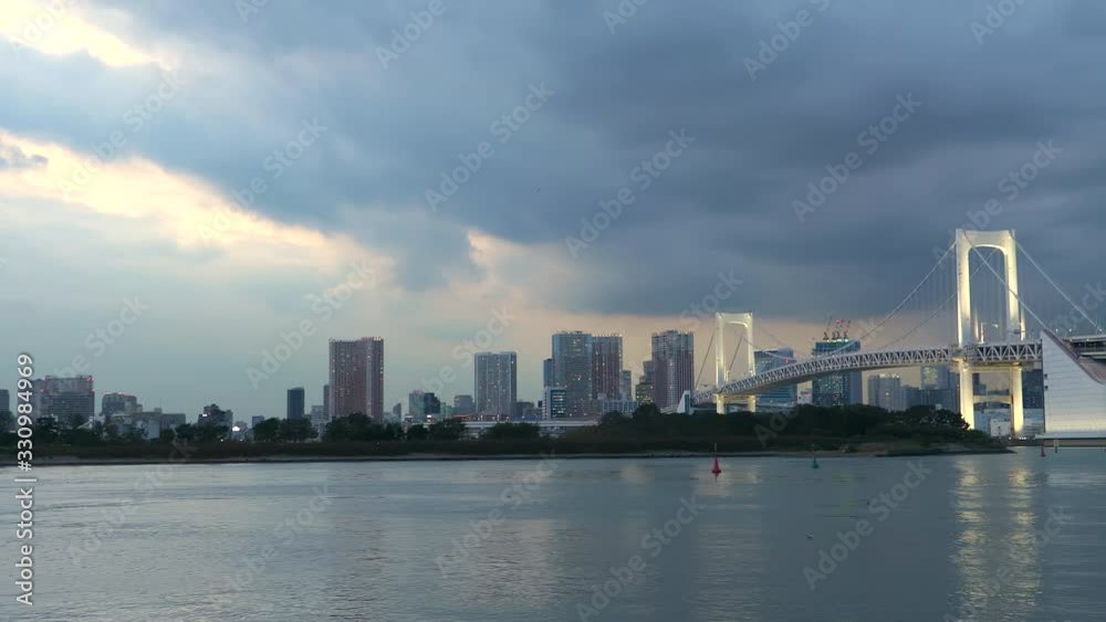 The view of the long bridge across the river in Tokyo Japan The view of the long bridge across the river in Tokyo Japan