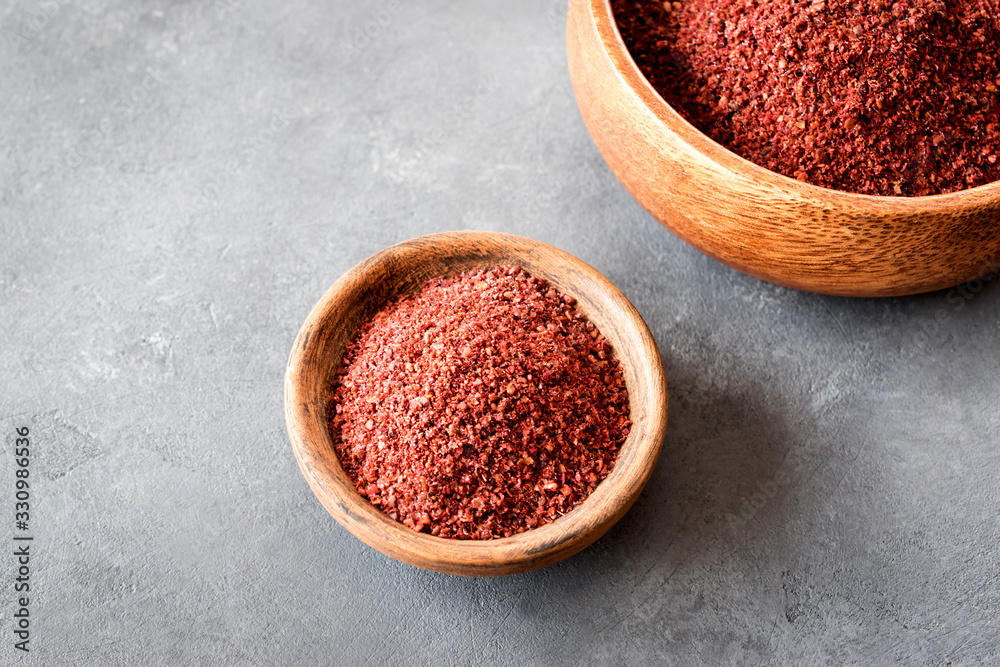 Sumak a spice from the ground berries of one of the types of sumac