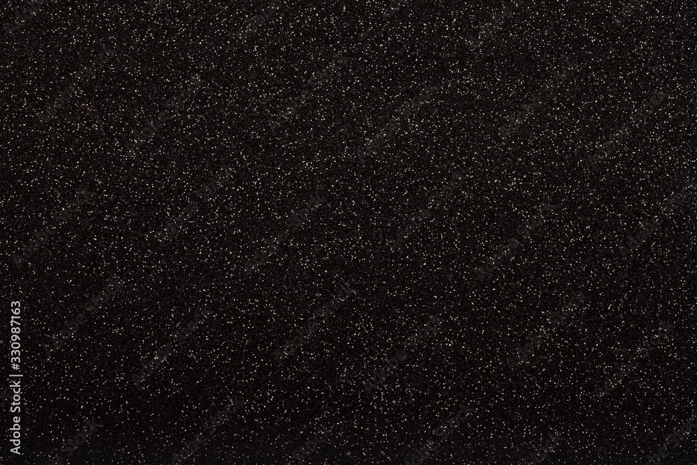 Black glitter texture. Top view