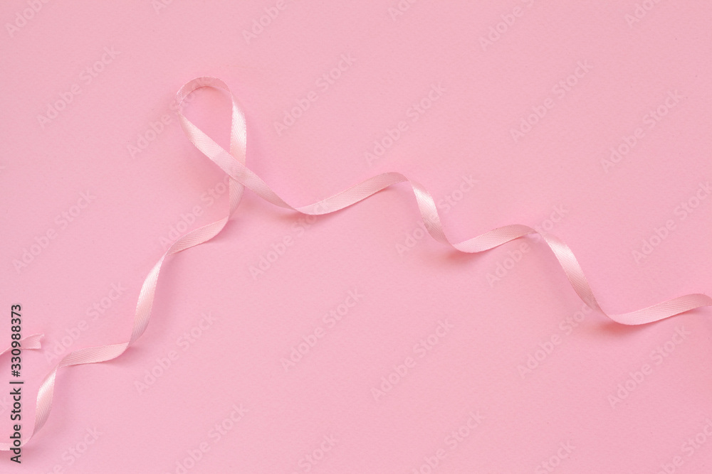 Pink ribbon breast cancer on pink background. Pink ribbon breast cancer on pink background.