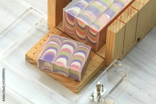 block of pretty pastel coloured soap on display photo