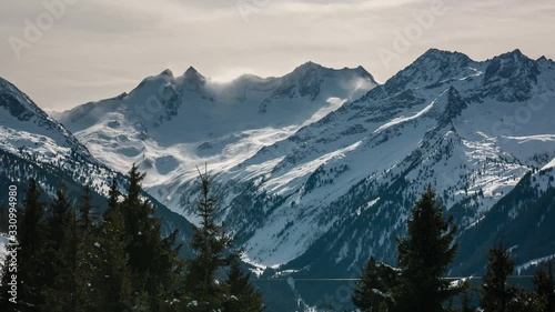 Wallpaper Mural Austria, Konigsleiten. Timelapse. The wind blows snow from the mountain peaks and quickly drives the clouds. Torontodigital.ca