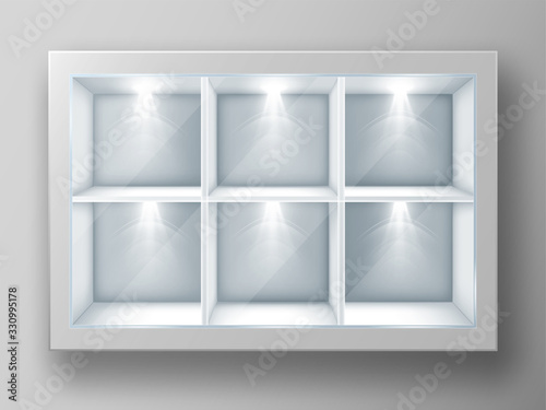 White showcase with square shelves in shop or gallery. Vector realistic mockup of empty glass display stand or bookshelf illuminated by spotlights for advertising or museum exhibition